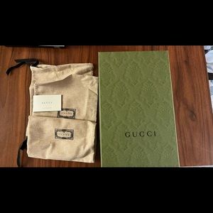 Gucci (empty) shoe box with dust bags.